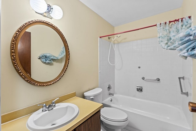full bathroom with toilet, vanity, and washtub / shower combination