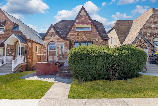 3418 N Oak Park Ave, Chicago, IL 60634 - english style home with brick siding and a front lawn