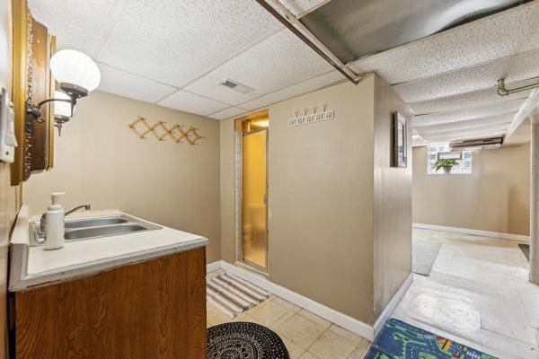 3418 N Oak Park Ave, Chicago, IL 60634 - clothes washing area with laundry area, separate washer and dryer, a sink, and light floors