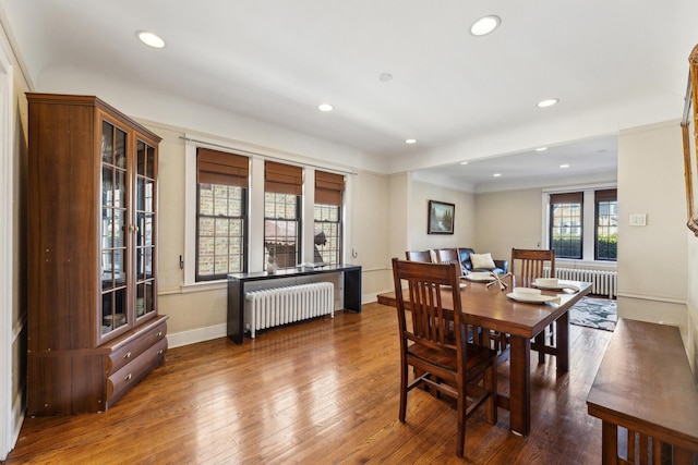 3418 N Oak Park Ave, Chicago, IL 60634 - dining room featuring baseboards, recessed lighting, radiator, and wood finished floors