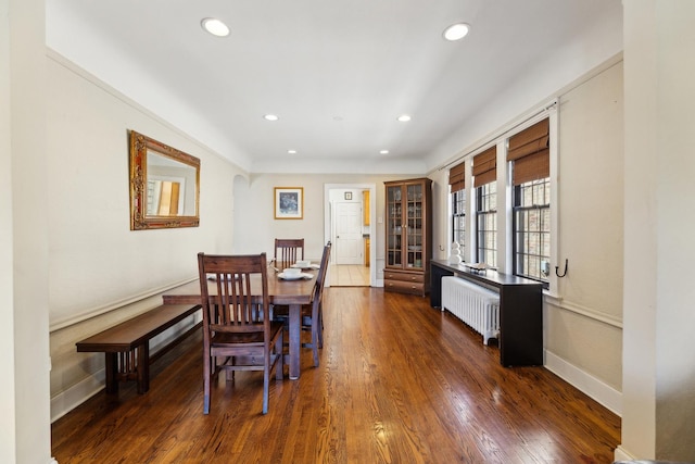3418 N Oak Park Ave, Chicago, IL 60634 - dining area featuring radiator, baseboards, dark wood-style floors, and recessed lighting