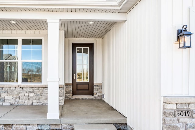view of exterior entry with stone siding