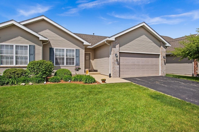 411 Anjali Ct, Sycamore, IL 60178 - single story home featuring asphalt driveway, a garage, a front lawn, brick siding, and a shingled roof
