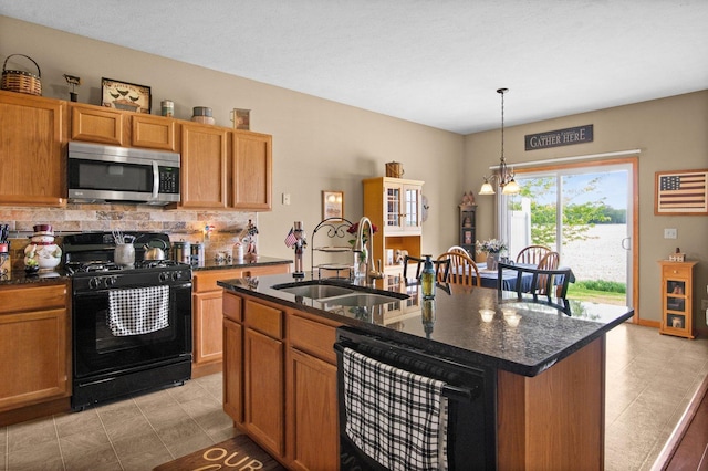 411 Anjali Ct, Sycamore, IL 60178 - kitchen featuring stainless steel microwave, gas stove, a sink, dishwashing machine, and decorative backsplash