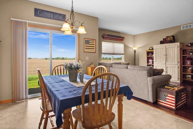 411 Anjali Ct, Sycamore, IL 60178 - dining space featuring a chandelier