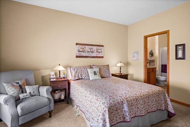 411 Anjali Ct, Sycamore, IL 60178 - bedroom with light colored carpet, baseboards, and ensuite bathroom