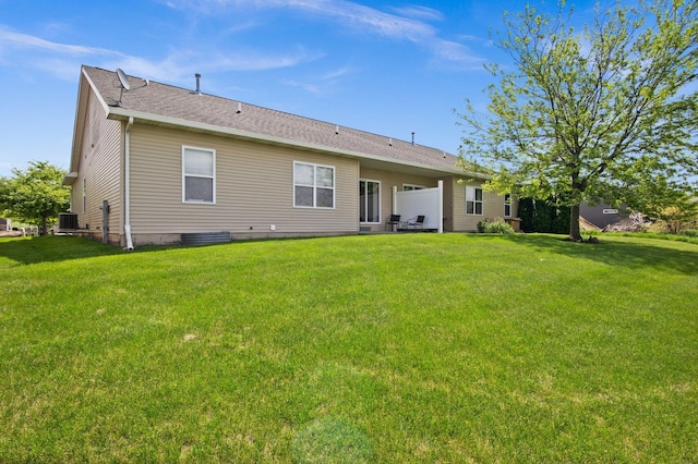 411 Anjali Ct, Sycamore, IL 60178 - back of house with a yard, central AC, and roof with shingles