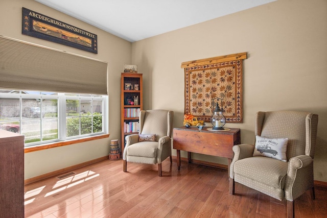 411 Anjali Ct, Sycamore, IL 60178 - living area featuring wood finished floors and baseboards