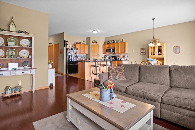 411 Anjali Ct, Sycamore, IL 60178 - living room with a chandelier and dark wood-style floors