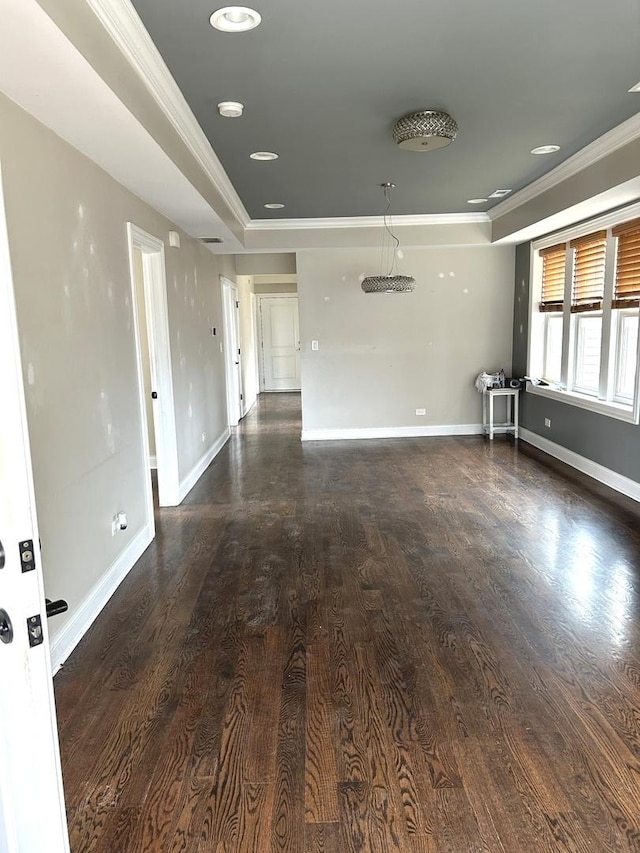 5810 W 64th Pl, Chicago, IL 60638 - unfurnished living room featuring crown molding, baseboards, and dark wood-style floors