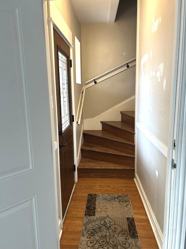 5810 W 64th Pl, Chicago, IL 60638 - foyer entrance with wood finished floors, stairway, and baseboards