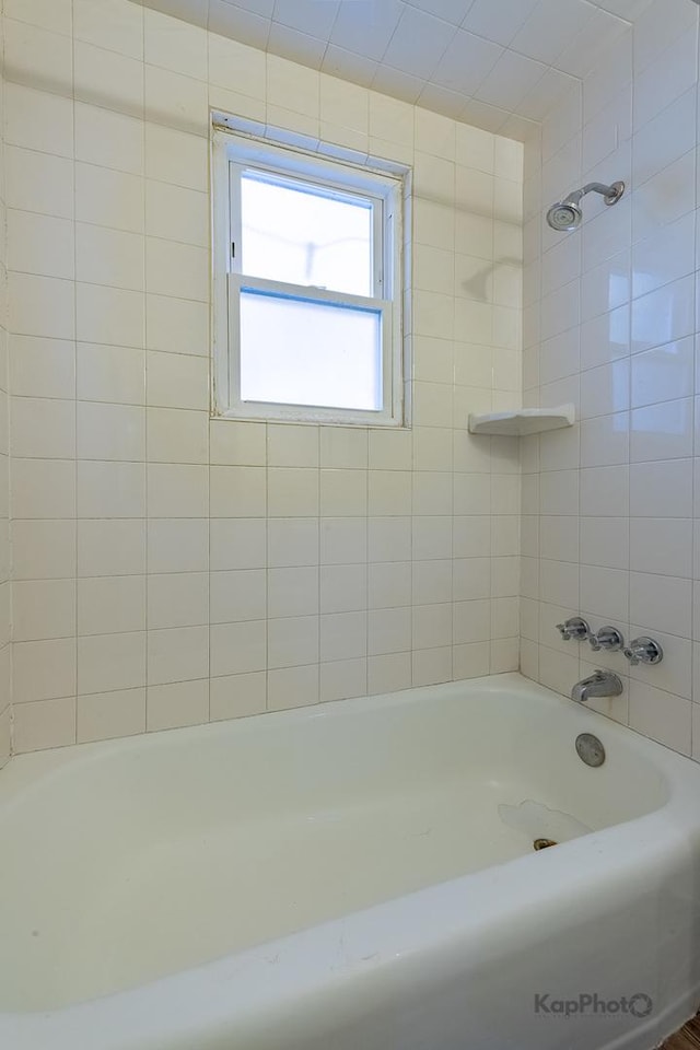 bathroom with shower / bathing tub combination