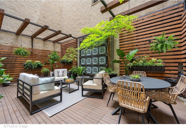 deck with a pergola and an outdoor living space