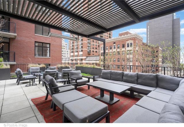 view of patio / terrace featuring an outdoor living space and a view of city