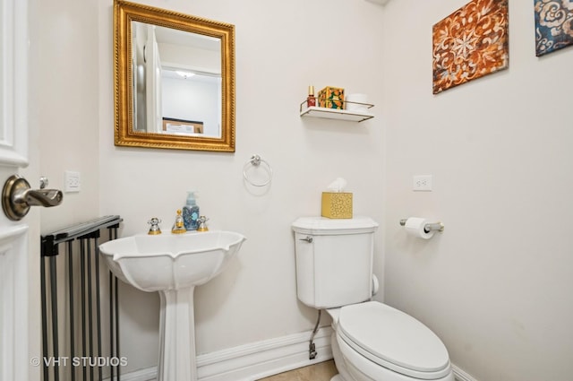 195 N Harbor Dr Unit 2602, Chicago, IL 60601 - bathroom featuring baseboards, a sink, and toilet