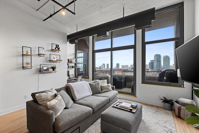 900 N Kingsbury St Unit 878, Chicago, IL 60610 - living area featuring baseboards, wood finished floors, and a high ceiling