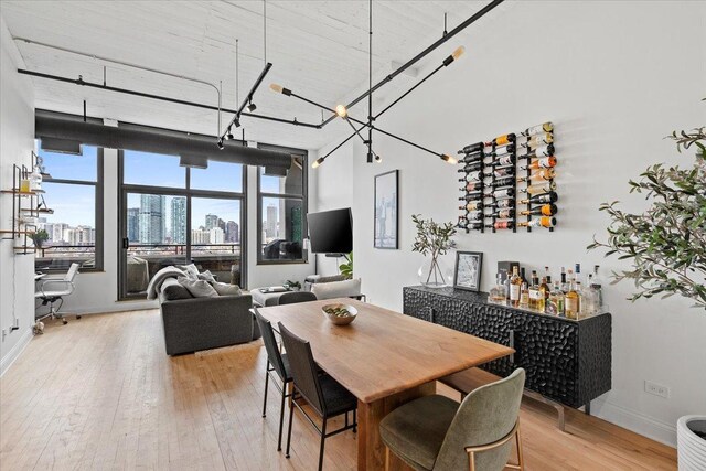 900 N Kingsbury St Unit 878, Chicago, IL 60610 - dining area with light wood-type flooring and baseboards
