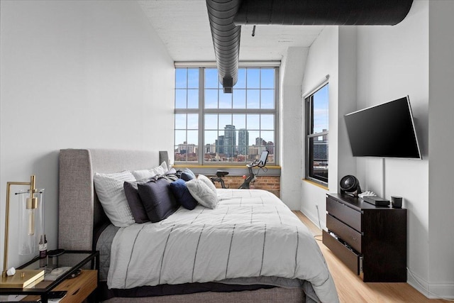 900 N Kingsbury St Unit 878, Chicago, IL 60610 - bedroom with light wood-style floors and baseboards