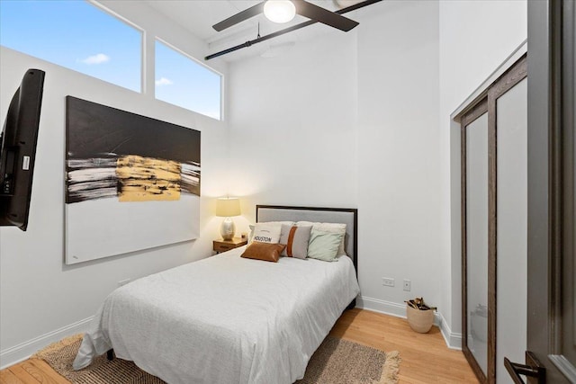 900 N Kingsbury St Unit 878, Chicago, IL 60610 - bedroom with wood finished floors, ceiling fan, and baseboards