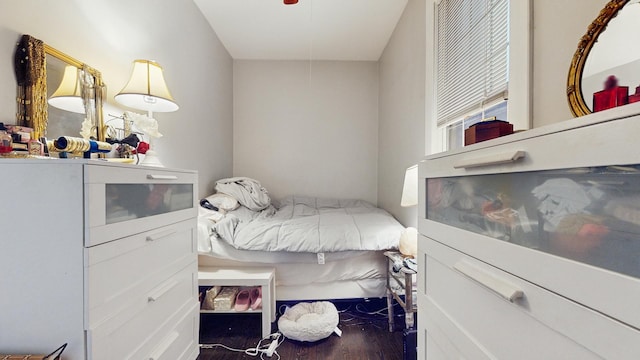 bedroom with wood finished floors