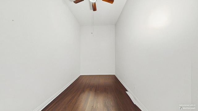 empty room featuring ceiling fan, baseboards, and dark wood-style floors