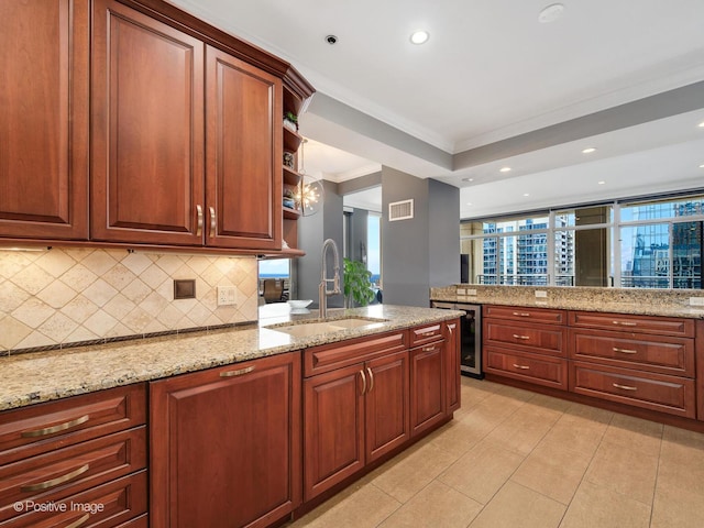 kitchen with open shelves, ornamental molding, beverage cooler, tasteful backsplash, and a sink
