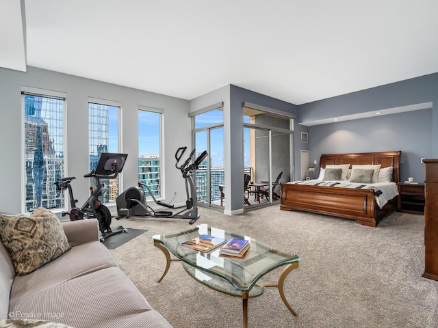 bedroom with carpet floors and baseboards