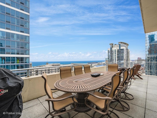 balcony featuring a water view