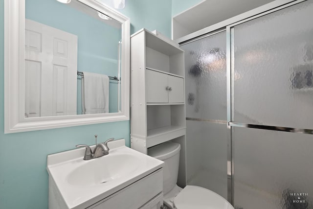 914 W Lynnwood Ave, Arlington Heights, IL 60004 - bathroom featuring vanity, a stall shower, and toilet