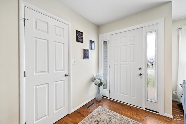 914 W Lynnwood Ave, Arlington Heights, IL 60004 - foyer entrance with visible vents, baseboards, and wood finished floors