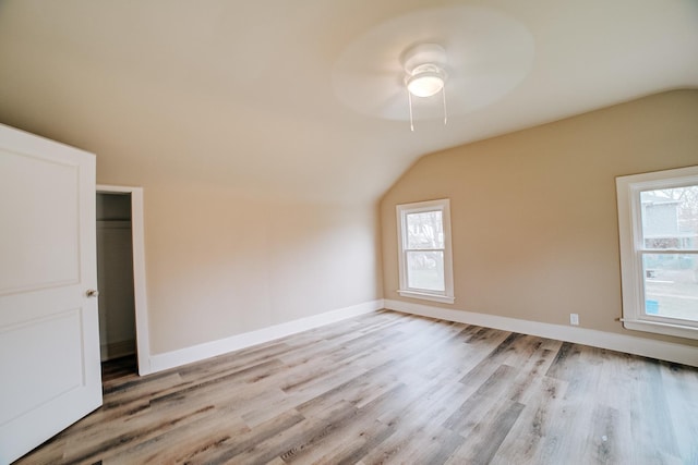 212 E Ash St, Watseka, IL 60970 - additional living space featuring lofted ceiling, light wood-style flooring, plenty of natural light, and a ceiling fan