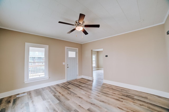212 E Ash St, Watseka, IL 60970 - entryway with a ceiling fan, light wood-style floors, ornamental molding, and baseboards