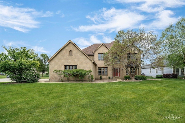 541 Clover Dr, Algonquin, IL 60102 - traditional home featuring a front lawn and brick siding