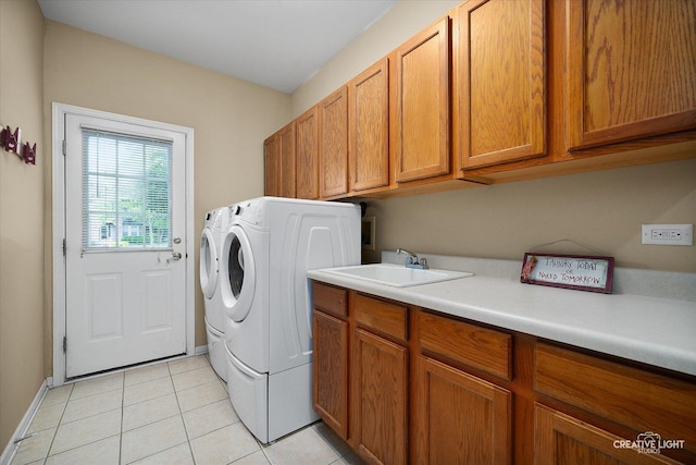 541 Clover Dr, Algonquin, IL 60102 - laundry area featuring cabinet space, washer and dryer, light tile patterned floors, and baseboards