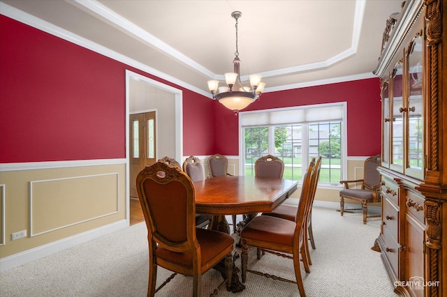 541 Clover Dr, Algonquin, IL 60102 - dining space with a wainscoted wall, light colored carpet, a raised ceiling, a chandelier, and ornamental molding