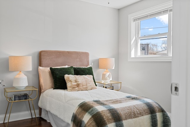 7943 S Blackstone Ave, Chicago, IL 60619 - bedroom featuring baseboards and wood finished floors