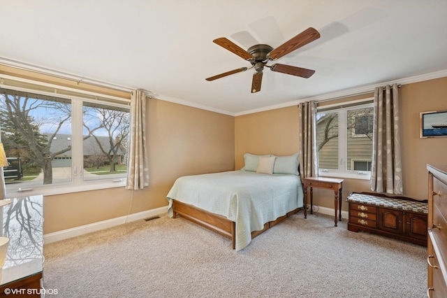 111 E Garden Ave, Palatine, IL 60067 - bedroom featuring crown molding, baseboards, a ceiling fan, and light carpet