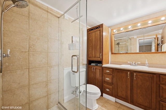 111 E Garden Ave, Palatine, IL 60067 - bathroom with a shower stall, vanity, ornamental molding, and toilet