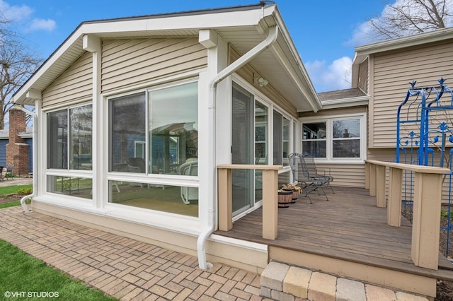 111 E Garden Ave, Palatine, IL 60067 - view of home's exterior featuring a sunroom and a deck