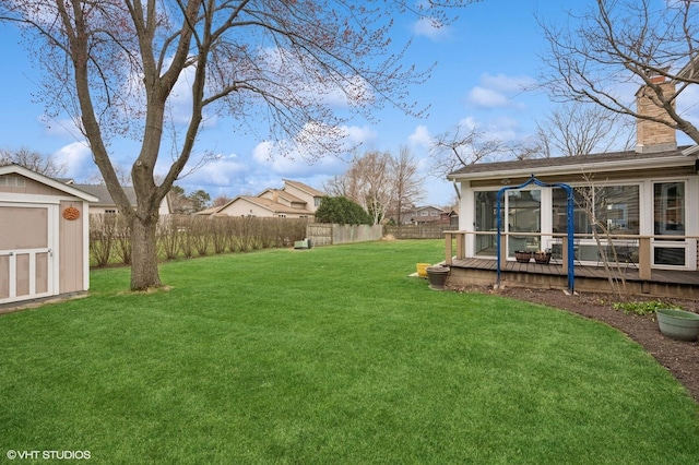 111 E Garden Ave, Palatine, IL 60067 - view of yard with an outbuilding, fence, a wooden deck, and a storage unit