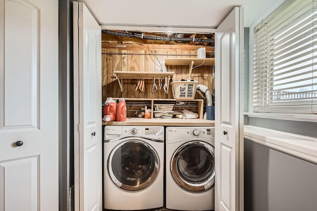 laundry area with laundry area and washing machine and clothes dryer