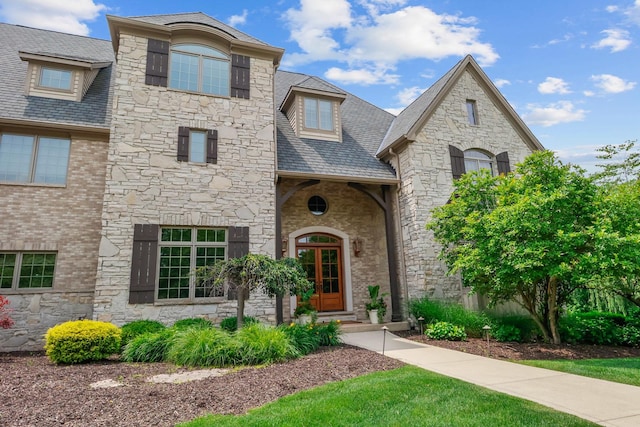 3131 Pepper Creek Bridge Pkwy, Valparaiso, IN 46385 - french provincial home with stone siding