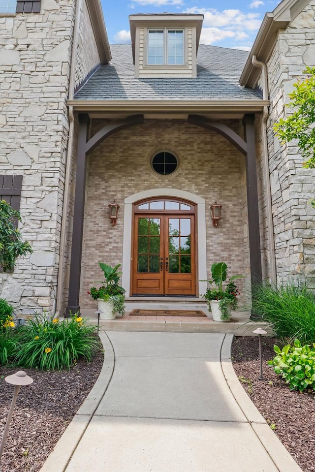 3131 Pepper Creek Bridge Pkwy, Valparaiso, IN 46385 - doorway to property featuring french doors and brick siding
