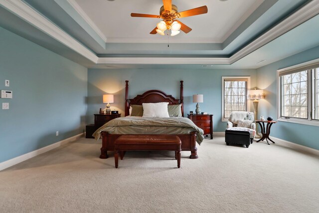 3131 Pepper Creek Bridge Pkwy, Valparaiso, IN 46385 - carpeted bedroom with a raised ceiling, ornamental molding, and a ceiling fan