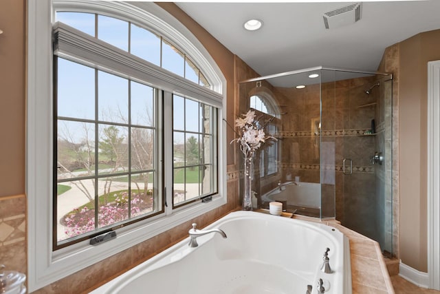 3131 Pepper Creek Bridge Pkwy, Valparaiso, IN 46385 - bathroom featuring a garden tub, healthy amount of natural light, a shower stall, and recessed lighting