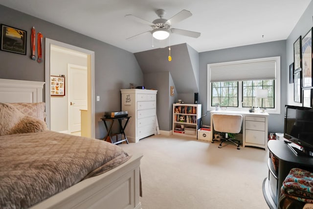 3131 Pepper Creek Bridge Pkwy, Valparaiso, IN 46385 - bedroom featuring a desk, light carpet, vaulted ceiling, and ceiling fan