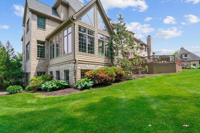 3131 Pepper Creek Bridge Pkwy, Valparaiso, IN 46385 - view of home's exterior featuring a yard and stone siding