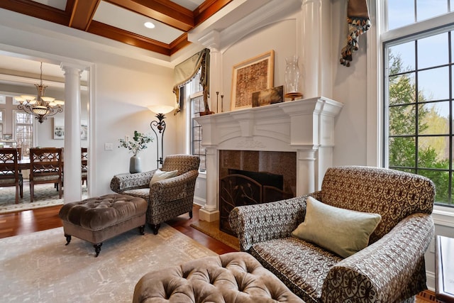3131 Pepper Creek Bridge Pkwy, Valparaiso, IN 46385 - sitting room featuring wood finished floors, plenty of natural light, decorative columns, crown molding, and beamed ceiling
