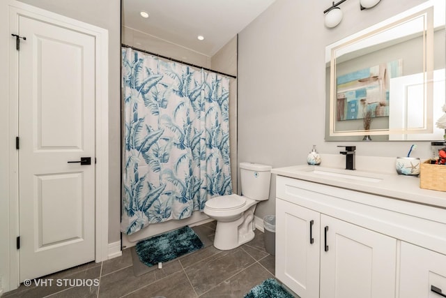 7427 S Bennett Ave, Chicago, IL 60649 - full bathroom with recessed lighting, vanity, a shower with curtain, and toilet