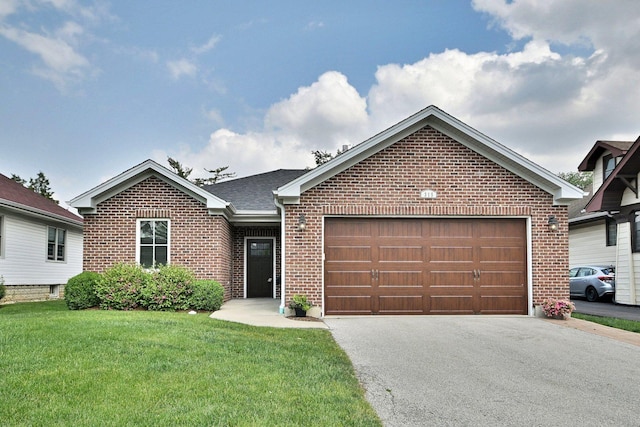 315 N Ridgeland Ave, Elmhurst, IL 60126 - single story home featuring brick siding, a front lawn, an attached garage, and asphalt driveway